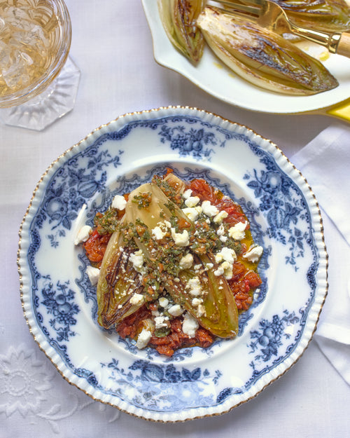 Roasted Endive with Chili Carrot Soffritto, Goat cheese & Carrot Top Salsa Verde